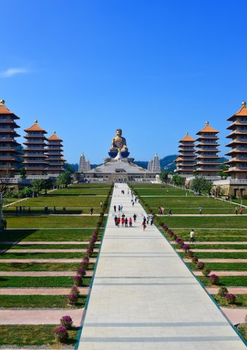 Chinese temple and golden Buddha statue in Kaohsiung, Taiwan.